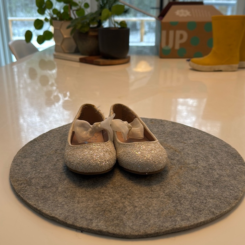 Next pumps with a a bow silver and white size 7 gently used